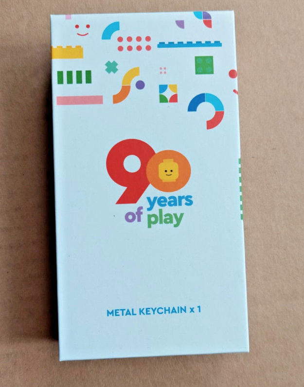 90 Years of Play Metal Keychain 1