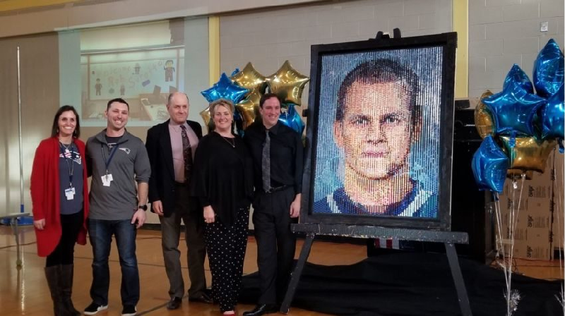 School children build US sporting heroes in LEGO mosaics