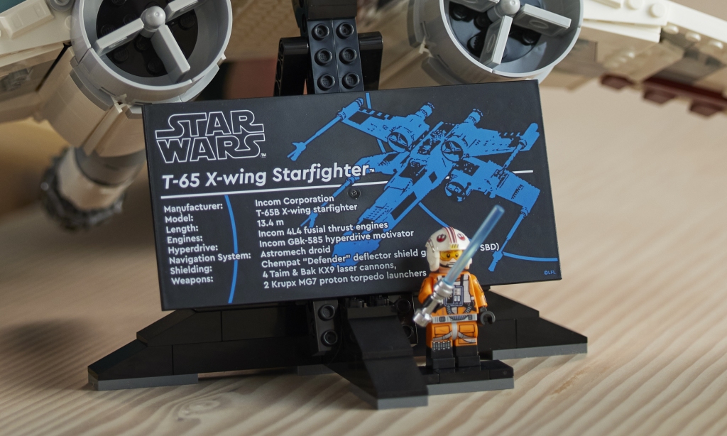 https://www.brickfanatics.com/wp-content/uploads/2023/04/LEGO-Star-Wars-75355-X-wing-Starfighter-plaque-1-1024x614.jpg