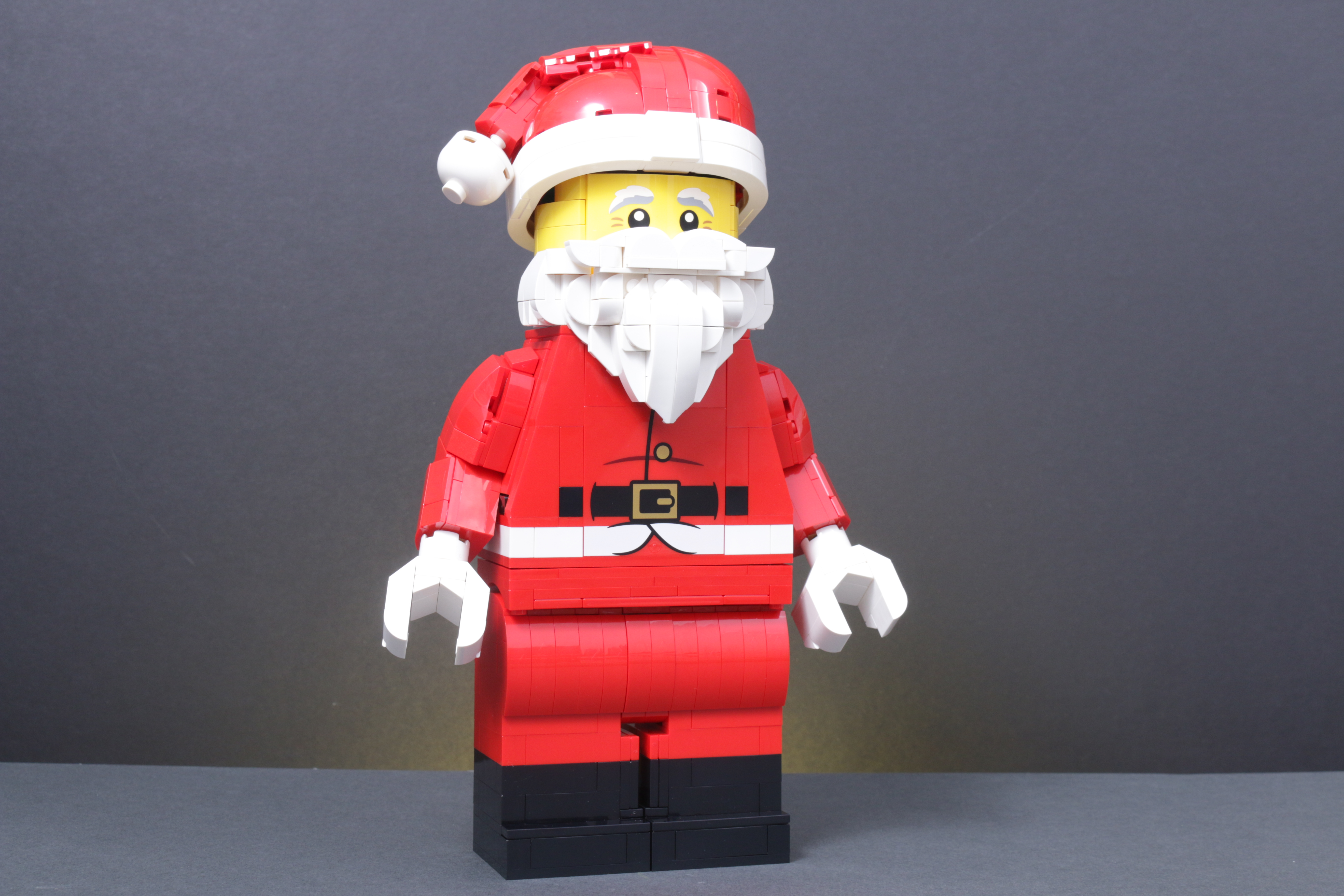 LEGO Christmas 2025 sets 40812 Snowman Ornaments 40809 Festive Gingerbread House 40820 Up-Scaled Santa Minifigure 40806 Gingerbread AT-AT Walker review 15